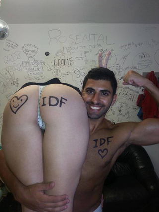 Illustration for article titled Israeli Women Stand With IDF By Showing Off Their Breasts and Asses